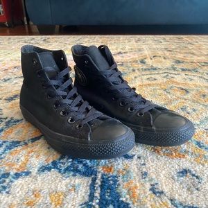 Blacked out high top converse